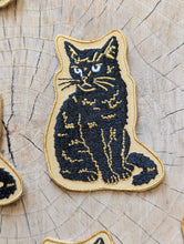 Load image into Gallery viewer, Iron-on patch | sitting black disappointed cat 2.9" x 2.2"