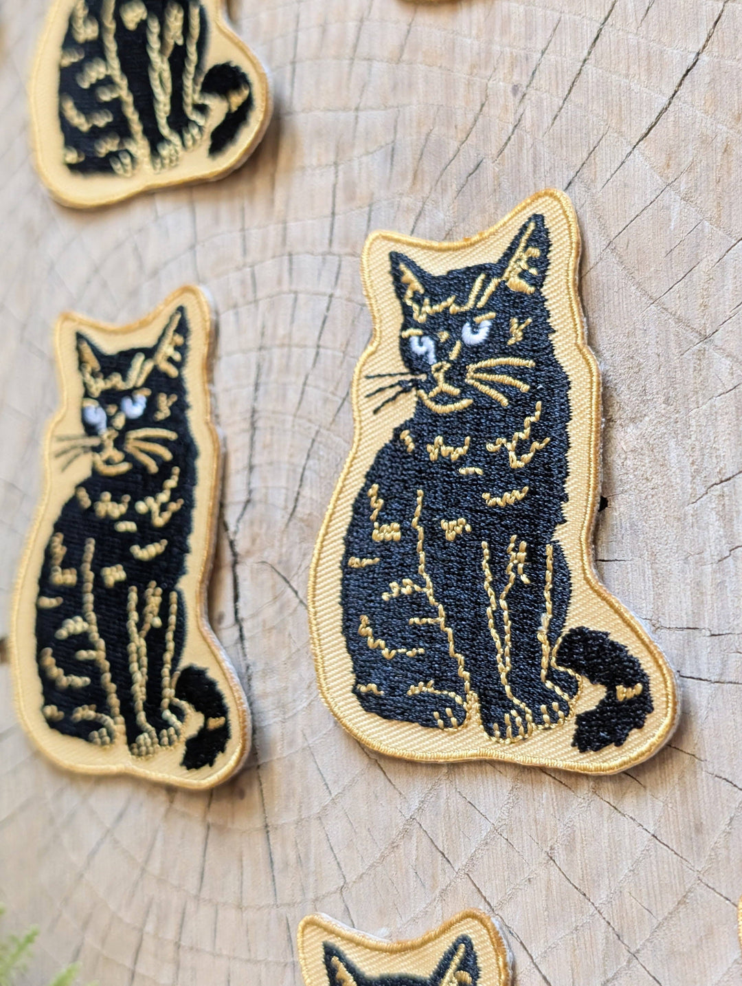 Iron-on patch | sitting black disappointed cat 2.9" x 2.2"